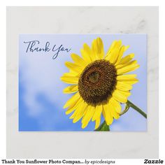 a thank you card with a sunflower in the foreground and blue sky in the background