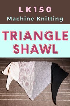 the triangle shawl is laying on the floor