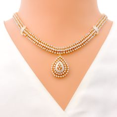 This exquisite 18k gold set, weighing 48.3 grams, features an opulent leaf-adorned design adorned with dazzling diamonds. The yellow gold finish enhances its luxurious appeal, making it perfect for any special occasion. The set includes a necklace with a total diamond weight of 7.47 carats, featuring F-G color and VS quality diamonds in round and tapered baguette shapes. The necklace has a length of 16.5 inches with a 1-inch drop length, adjustable 1-inch links, and a secure hook lock. The match Lock Style, Diamond Set, Gold Set, Quality Diamonds, A Necklace, Matching Earrings, Diamond Shapes, Gold Finish, Timeless Beauty