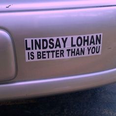 a sticker on the side of a car that says lindsey lohan is better than you