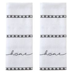 two white towels with the words home and hearts on them