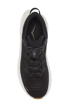 This all-purpose training shoe is updated with a single-layer mesh upper, a sock-like bootie and ghillie lacing to deliver a secure, well-balanced ride. The speckled regrind midsole and gum-rubber outsole are designed for lateral side-to-side movement so you easily transition from street to studio floors. Removable insole Neutral: provides soft, even cushioning with an emphasis on comfort during any activity Lace-up style Cushioned footbed Textile and synthetic upper/synthetic lining and sole Im Breathable Mesh Lace-up Walking Shoes For Training, Black Running Shoes With Ventilation And Round Toe, Black Running Shoes With Ventilation, Training Running Shoes With White Sole And Laces, Running Shoes With Laces For Training, Training Running Shoes With Laces And White Sole, Lace-up Running Shoes For Training, Black Athleisure Walking Shoes With Laces, Training Running Shoes With Laces