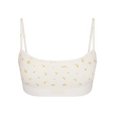 This scoop neck bralette will be your favorite everyday staple, featuring SKIMS logo details on the center front and a soft elastic under band for support. Fits true to size. Spring Sports Bra With Removable Pads, Scoop Neck Bra For Spring, Casual Sports Bra With Removable Pads For Spring, Spring Loungewear Bra With Removable Pads, Spring Casual Cropped Bra, Cropped Sports Bra With Adjustable Straps For Spring, Spring Cropped Sports Bra With Adjustable Straps, Trendy Spring Loungewear Bra, Light Grey Leggings