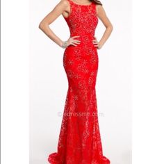 This Chic Red Dress From Jovani Features An Illusion Neckline, All Over Floral Lace With Sparkle Embellishments And An Alluring Semi-Sheer Skirt. A Beautiful Stand Out Piece! Elegant Red Embellished Evening Dress, Red Lace Sleeveless Evening Dress, Red Sleeveless Lace Evening Dress, Elegant Red Lace Evening Dress, Red Lace Floor-length Evening Dress, Red Lace Evening Dress With Sweep Train, Red Lace Dress With Sequins, Red Lace Dresses With Sequins, Red Lace Evening Dress For Prom