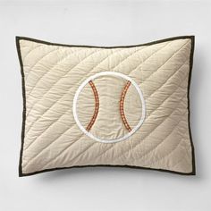 a pillow with a baseball design on it