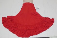 This is a brand new Flamenco skirt with the original hang tag from Mainstreet Dancewear. It is a solid knit 8 gore skirt with two ruffles at the hem, and a drawstring waist.  The color is red and size available is large adult.   The drawstring is embedded in that bump in the elastic of the waistline.  Refer to the measurement guide provided with the pictures to confirm a good fit. This item retails for $70 in adult sizes. We love to combine shipping so check out our other listings and see what y Gore Skirt, Flamenco Skirt, Find Style, Drawstring Skirt, Gored Skirt, Research Images, Dance Costume, Hang Tags, Dance Costumes