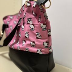 Hello Kitty, Pink And Black So Duffel With Straps Pockets On Both Sides, Both Fronts And On The Inside Hello Kitty Pink And Black, Hello Kitty Bags, Hello Kitty Bag, Hello Kitty Pink, Plush Backpack, Black Tote, Pink And Black, Both Sides, Pink Black