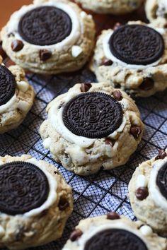 cookies with oreos and chocolate chips on a cooling rack