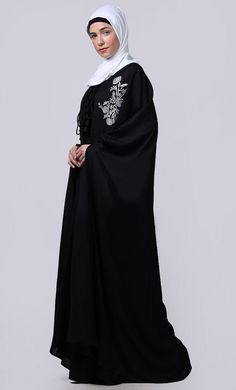 Essence Abaya is the simple, comfortable, easy and reliable breathable abayaA Proper Dress Is A Very Important Part Of Salah/Namaz. It Not Only Covers Us In A Proper Manner But It Also Relieves Us Of Consciousness Of Not Exposing The Awrah. The abaya Is Traditionally Worn Over Your Clothes For any occasion, Reading Of Quran Or Additional Modesty When In Groups. This Article Is Made Of Cotton Fabric Which Is Very Soft, Breathable, Light Weight And Easy To Maintain. It Gives A Good Fall To The Gar Modest Black Kaftan For Eid, Black Abaya With Modesty Panel For Eid, Black Embroidered Floor-length Abaya, Black Long Abaya With Modesty Panel, Modest Black Thobe For Eid, Kaftan Style, Patch Work, Embroidered Patch, Embroidered Patches