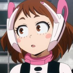 an anime character with headphones on her ears