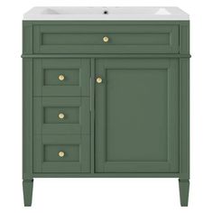 a bathroom vanity with drawers and a sink in the center, painted dark olive green