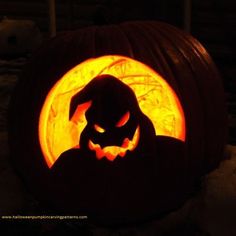 a pumpkin carved to look like a dog