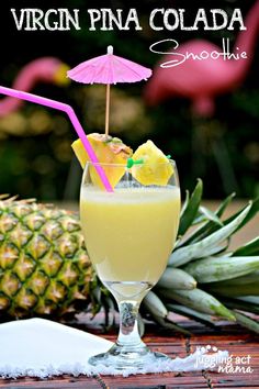 a pineapple drink is garnished with an umbrella