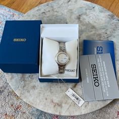 Seiko Coutura Daimond Watch. 24 Daimonds. Brand New In Box. Silver And Gold Hardware. White Diamond Watch With Polished Finish, White Diamond Watch With Polished Finish As Gift, Seiko Gold Watch, Seiko Coutura, Vintage Seiko Watches, Seiko Gold, Bracelet Watches Women, Art Deco Bracelet, Seiko Watches