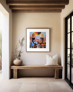 a painting hangs on the wall next to a wooden bench with two vases and a potted plant