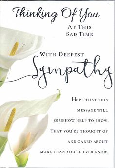 a sympathy card with white flowers on it