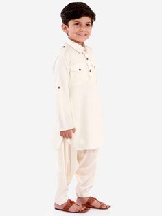 VASTRAMAY Boys Cream Cotton Blend Pathani Suit Set The VASTRAMAY Boys Cream Cotton Blend Pathani Suit Set is an elegant and traditional outfit perfect for special occasions. Designed for comfort and style, this suit set ensures your little one looks charming and feels comfortable. Features Elegant cream color Traditional Pathani design Comfortable fit Suitable for special occasions Specifications Brand: VASTRAMAY Color: Cream Material: Cotton blend Size: Available in various sizes Material & Car