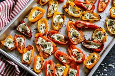 baked stuffed bell peppers on a baking sheet