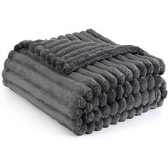 stack of gray towels folded on top of each other