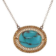 This is part of Chairish’s Fine Jewelry assortment.  A fine repurposed Victorian period 14K gold pendant with a natural polished turquoise in the center.  The bezel set stone is surrounded by a gold filigree frame.  The chain is marked 14K and is the adjustable type which allows you to wear it two inches shorter.  Condition is excellent.  The back of the pendant also has an applied small plaque stamped 14K.  It dates c. 1890.  Dimensions: 18" or 16", Pendant: Width: 1", Length: 3/4", Weight:  5. Gold Oval Turquoise Gemstone Necklace, Gold Turquoise Pendant Necklace With Cabochon, Antique Oval Turquoise Necklace, Antique Turquoise Oval Necklace, Filigree Frame, Victorian Period, Gold Filigree, Turquoise Pendant, Bezel Setting