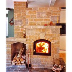 a fire place in the middle of a living room