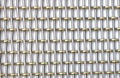 metal mesh with gold pins on it