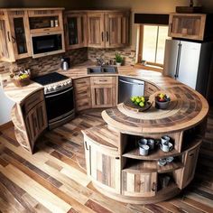 a kitchen with wooden floors and an island in the middle, surrounded by cabinets that are made out of wood planks