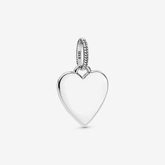 Show them the shape of your heart with the enduring symbol of love. This pendant can be engraved with your own special message. Crafted from sterling silver, our heart pendant is perfect for giving a voice to how you feel. This Pandora piece is all about self-expression: choose to keep it blank and let the symbol speak for itself or engrave the front, the back or both. Pandora Engraving is only available in select stores and markets. - Pandora Engravable Heart Tag Pendant - Sterling silver Pandora Engraving, Stackable Birthstone Rings, Pearl Diamond Jewelry, Gold Armband, Heart Tag, Solid Gold Necklace, Solid Gold Earrings, Gifts For Sister, Charm Rings