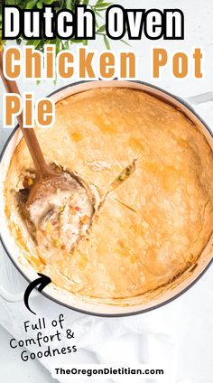 a chicken pot pie with a wooden spoon in it and text overlay that reads dutch oven chicken pot pie