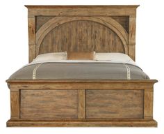 a wooden bed frame with an arched headboard