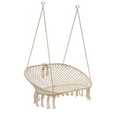 a hanging hammock chair with tassels