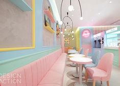 the interior of a restaurant with pastel colors