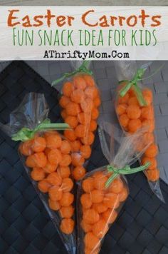 some carrots are wrapped in plastic and sitting on a table with the words, easter carrots fun snack idea for kids