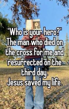 a person holding up a book with the caption who is your hero? the man who died on the cross for me and restructed on the third day jesus saved my life