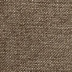 a close up view of a brown fabric textured with some sort of woven material