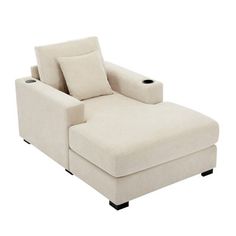 a white couch with two pillows on it