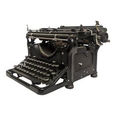 an old fashioned typewriter sitting on top of a white surface with the keys missing