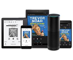 an amazon echo device, tablet, and other electronic devices are shown in this image