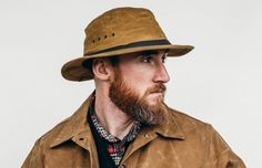 Classic Brown Hat With Waxed Finish, Cotton Hats For Outdoor Fall Activities, Waterproof Casual Hats For Outdoor Work, Casual Waterproof Hats For Outdoor Work, Classic Outdoor Waxed Finish Hats, Rugged Hats For Outdoor, Classic 5-panel Hat For Outdoor, Casual Brimmed Hats For Outdoor Work, Casual Curved Brim Hat For Outdoor Work