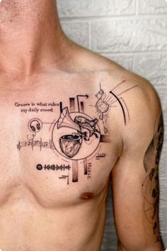 a man's chest with some drawings on it