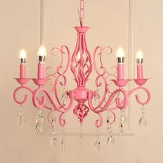 a pink chandelier hanging from the ceiling