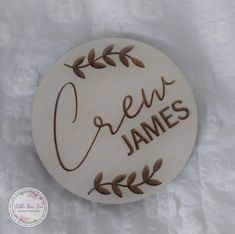 a wooden plaque with the words green james written in cursive writing on it