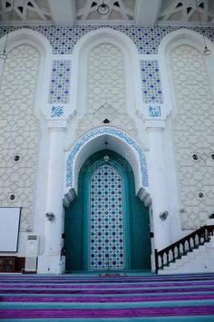 the entrance to an ornate building with blue and white tiles on it stock photos - image