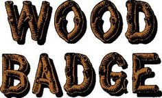 the words wood badge are in brown and black letters that spell out what to do with them