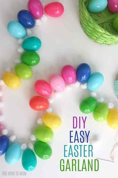 an easter garland made out of plastic eggs with the words diy easy easter garland