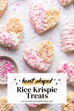 heart shaped rice krispie treats with pink sprinkles on top and white background