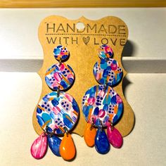 Brand New & Hand-Painted Chandelier Earrings In Pink, Blue, Silver, Teal & Orange. These Are Super Fun And Funky! Approx. 4” In Length And Very Light. Make A Statement! Artsy Blue Earrings For Party, Artistic Blue Party Earrings, Handmade Metal Multicolor Chandelier Earrings, Festive Multicolor Chandelier Earrings, Fun Blue Hand Painted Earrings, Fun Hand Painted Blue Earrings, Whimsical Blue Hand Painted Earrings, Whimsical Hand Painted Blue Earrings, Pink Hand Painted Dangle Earrings