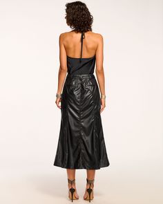 Rock your edge in the Dale faux leather midi skirt. This button-down midi skirt will catch eyes, while being a staple silhouette in your closet. Pair it with a white t-shirt, or dress it up with a sleek black top and some boots and you'll be the coolest in the room. Size & Fit – Fits true to size, take your normal size – Model is Wearing Size 0 – Model is 5'9"– Length: 51", based on a size S Size Guide Details & Care – Midi skirt – Fitted top and flared bottom – Belt loops – Button down silhouet Faux Leather Midi Skirt, Leather Midi Skirt, Ramy Brook, Room Size, Fitted Top, White T Shirt, Black Top, White Tshirt, Size Guide