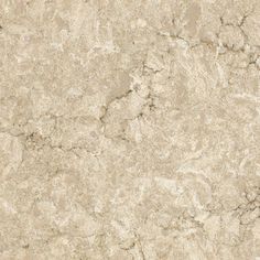 a close up view of a beige marble surface