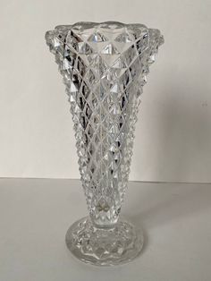 a crystal vase sitting on top of a table